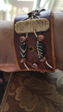 Custom leather cuffs