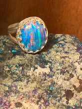 Hand cut/smithed lab grown peacock opal ring